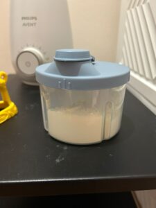 Baby travel essentials - formula milk container